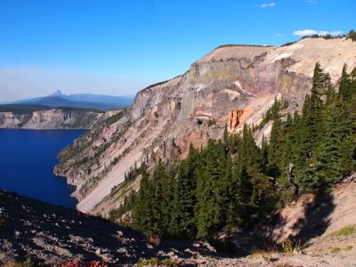 [The orange rock formation is about two-thirds the way up the side of rim of the caldera. Ther rest of the rock is the more usual tan and brown.]